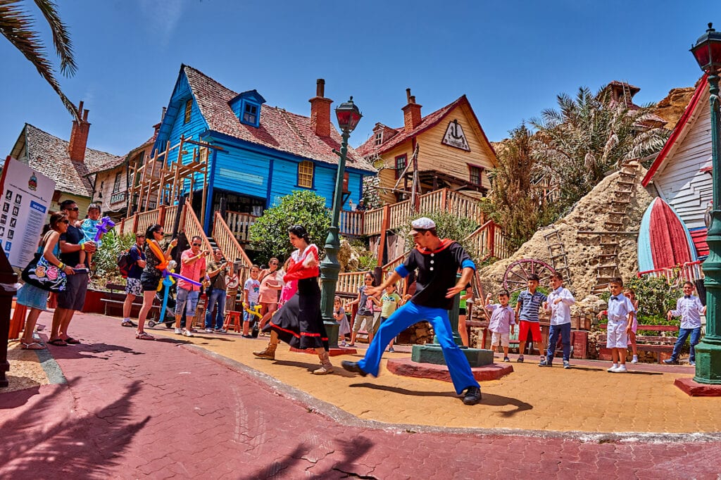 Popeye Village Characters Dancing In the Street
